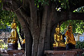 Bagan Myanmar. Shwezigon pagoda. The precinct is full of numerous images, inscribed bells, stone inscriptions and other paraphernalia.  